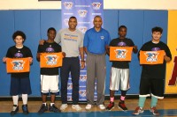 The resident student/athletes at Children’s Village welcomed Westchester Knicks General Manager Allan Houston (left center) and the inaugural Head Coach of the Westchester Knicks Kevin Whitted, who both led the children in a basketball clinic, on the Dobbs Ferry campus, on Thursday, Oct. 9. Albert Coqueran Photo                                         