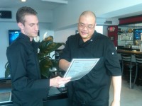 Owner Michael Cuozzo (left) with Chef Ken Austria at Tuck’d Away Bar and Grill. 