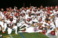 The Stepinac High School Football Team celebrates on the field in Melville, NY, after beating St. Anthony’s High School for the first time since 1983. The Crusaders beat the Friars, 38-21, on Friday, to remain undefeated at 7-0 this season. Albert Coqueran Photos