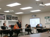 Brewster board of education members listen to a facilities report from Russell Davidson of KG&D Architects.