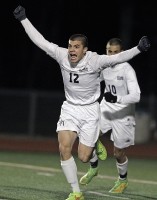 Brandon Drossman | The Examiner News Byram Hills' Brandon Drossman celebrates after scoring the goal in overtime that lifted the Bobcats to the Class A title over Yorktown.