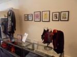 Some of the artwork on the walls of Tiger Lily, a Mount Kisco boutique, from California-based artist Asandra.