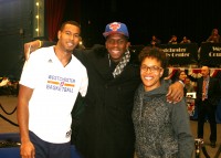 [L-r] Westchester Knicks forward Orlando Sanchez is greeted by his fellow St. John’s University alumni legend Felipe Lopez and NY Liberty legend Teresa Weatherspoon, before the start of the Westchester Knicks Home Opener.