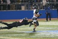 Yorktown RB Nick Santavicca is caught by a shoelace on a potential game-changing TD run that wasn't in Huskers' 35-14 loss to Rye.