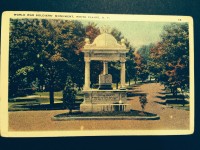 An old postcard shows how the White Plains World War memorial once looked with the eagle sitting at the very top of the dome.