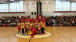 Bedford School District students join the Harlem Wizards on the court at Fox Lane High School for Sunday's charity event.