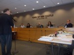 The New Castle Town Board listens to a speaker at one of the recent public hearings on the proposed Chappaqua Crossing rezone.