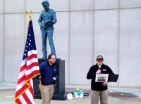 : Frank Morganthaler (right) honors the memory of NYPD officers Rafael Ramos and Wenjian Liu. The Westchester County Police Memorial is to the left. 