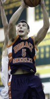 Greeley's Cameron Ciero gets inside for a basket in last Thursday's Quaker victory over Carmel.