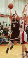 Zach Evans | The Examiner News Junior PG and team captain Zach Evans will look to run the offense for the Huskies again.