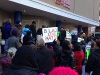 Demonstrators gather in front of Wal-Mart on Main Street, White Plains.