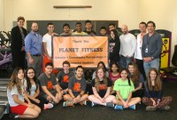 WPHS Athletic Director, Jennifer DeSena (left), Planet Fitness Owner, James Innocenti (second left) with (r–l) Charlie Norris, V.P. White Plains Board of Education, Highlands Middle School teacher, Steve Fugarino and Planet Fitness Maintenance Manager, Joe Franco, join the students of WPHS to celebrate the opening of their new Fitness Center with equipment donated by Planet Fitness. Albert Coqueran Photos