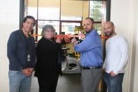 :  [R-l] Charlie Norris, V.P. White Plains Board of Education, WPHS Principal, Ellen Doherty, Planet Fitness Owner, James Innocenti and Joe Franco, the NY and Westchester Maintenance Manager for Planet Fitness, cut the ribbon to open White Plains High School’s new Fitness Center. 