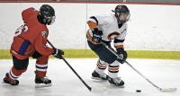 Horace Greeley's Sam Mishkind takes the puck along the left wing in Friday's game vs. Somers/North Salem. 