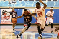 Crusaders guard Kobe Miranda dribbles around Marshall’s Bryan Assie in the Big Apple Basketball Invitational at Baruch College. Miranda made four of his six shots in the game, while scoring nine points in the Stepinac, 70-65 win. 
