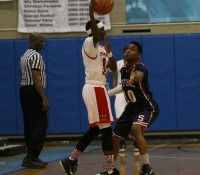Sports-5 | The Examiner News Stepinac sophomore Jorden Means (right) is future star for the Crusaders. Means displays his defensive skills against Marshall Academy of the PSAL AA, at the Big Apple Basketball Invitational, at Baruch College on Saturday.