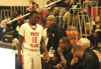 Tigers Head Coach Spencer Mayfield (center) has a few words of instructions for Lamar Noel (left), as he substitutes for his promising junior guard during the Tigers loss to Mt. Vernon, 58-45, on Wednesday, Jan. 21. Albert Coqueran Photos