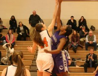 Tigers-1 | The Examiner News Tigers center Isabella Lacarbonara (left) jumps against Huguenots center Dionna Rogers (right) as the statement-game for White Plains this season gets underway at WPHS, on Thursday, Jan. 8. White Plains lost to New Rochelle, 54-49, but the future looks bright. Albert Coqueran Photo