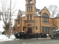 Mourners leave Chabad of the Rivertowns in Dobbs Ferry Friday after the funeral of Ellen Brody. 