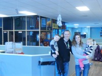 Leanne and Keith Murphy hold son Jack and daughter Chloe in their arms, a temporary break for the two young who love running around in Jack’s Clubhouse. The business opened in October and brought many young children and happy parents to a unplug zone.