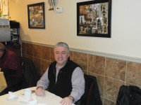 Antonino Cannavo sits inside his new restaurant Ristorante Spadafora welcoming and talking comfortably with customers throughout the night.  DAVID PROPPER PHOTO 