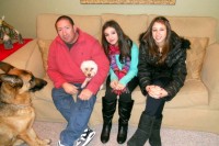 Glen Hochman with and his daughters Alissa and Deanna and two of their dogs.