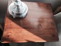 The gleaming surface of The Home Guru’s nightstand, a satisfying quick and easy one-afternoon refinishing project that opted for a polyurethane finish rather than varnish or shellac because of its quicker drying time.