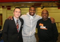 White Plains High School basketball legend Sean Kilpatrick (center) was reunited with his former Tigers teammate Jordan Griffith (left) and high school coach Spencer Mayfield (right), when he returned to White Plains with the Delaware 87ers to play the Westchester Knicks, at the County Center, on Friday. Albert Coqueran Photos