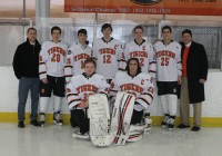 The White Plains High School Hockey Team celebrated Senior Night at Ebersole Ice Rink, before they shutout Pelham High School 4-0, on Thursday, Feb. 12. The win notched Head Coach Howard Rubenstein his 250th career-win. Pictured are (front) senior goalies Teddy Buck and Chris Stangarone. [Standing l-r] Assistant Coach Dave Lynch with seniors Jarrett Sannerud, Anthony DeMaria, Matt Conroy, Mike Carrier and Nico Mancini with Coach Rubenstein. Albert Coqueran Photo 