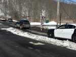 The Roaring Brook Road grade crossing in Chappaqua where a motorist got stuck on the tracks when the gates came down on her car Saturday morning.