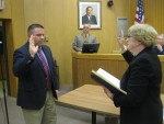 Nicholas DiPaolo was sworn in as the new Mount Pleasant Town Board member by Town Clerk Patricia June Scova on Tuesday night. Looking on is Supervisor Carl Fulgenzi.