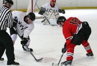 White Plains Firefighter Nick Williams (left) faces off against Westchester Firefighter Tom Hensler during the “ Battle of the Bravest” at the Ebersole Ice Rink, on Saturday. 