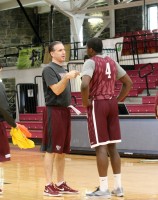 Fordham freshman standout Eric Paschall from Dobbs Ferry (right) gets instructions from Rams Assistant Coach Tom Parrotta, at practice in the Rose Hill Gym. Parrotta is a 1984 graduate of Stepinac High School. 