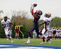 Crusaders wide receiver Giancarlo Furio leaps to catch a pass in the end zone for a touchdown. Furio, who was selected to the All-CHSFL Team last season, has committed to play for the University of Rhode Island next year. Photo courtesy Stepinac Athletics.                   