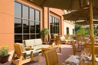 The outdoor dining patio at the Toasted Barrel at the Sheraton Tarrytown, which features burgers, baby back ribs, steak, fish and more.