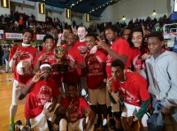 The 2014-15 Woodlands Boys Basketball Team hold the Section 1 Class B Championship Gold Ball, after defeating Briarcliff High School, 56-50, to capture the Section 1 Class B Title, at the Westchester County Center, on Saturday. It is the second straight year the Falcons captured the Class B Championship. Photo by Lonnie Webb Photography 