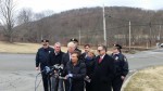 Rep. Nita Lowey, surrounded by local, county and state officials, on Tuesday called for more aggressive enforcement of drivers who ignore warnings at rail crossings as one way of increasing safety.