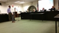 398 Pville Energy Program pic | The Examiner News Mike Gordon, co-chairman of Sustainable Westchester, explains the advantages of a community choice aggregation buying program during a presentation last week before the Pleasantville Village Board.
