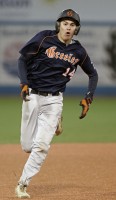 Greeley's Quinn Carter races toward third base in the Quaker win vs. John Jay. 