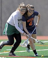 Pleasantville's Alyssa Rufino (left) and Briarcliff's  Nicole Nero battle for possession of a ground ball.