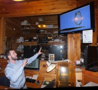 Jewelry designer Jordan Judd demonstrates the process of 3-D computer imaging in the manufacturing area of the Scarsdale store. Tony Seideman Photo