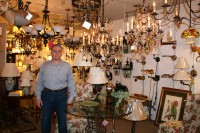 Drew Nichols, one half of the husband-and-wife team that owns and operates Bedford Lighting & Home, which carries a wide variety of fixtures and lighting-related products. PHOTO: Colette Connolly