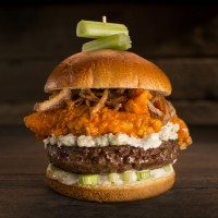 The buffalo wing burger, part of Dave & Buster's list of specialty burgers.