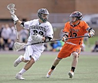 Pleasantville's Josh Della Puca tries to run past Owen Lynch of Briarcliff.  