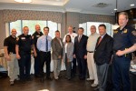 Nichola Johnson, center, executive director of The Bristal at Armonk, is surrounded by members of the North Castle Police Department and the town's elected officials for The Bristal's first Heroes Breakfast, which honored area emergency service workers.