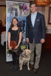 Guiding Eyes graduate Emilie Gossiaux and with her guide dog, London, and New York Giants quarterback and nine-time Golf Classic host Eli Manning attended the Spring Tee-Off for the 38th annual Guiding Eyes for the Blind Golf Classic. 