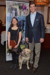 402 Guiding Eyes Classic Kick Off pic | The Examiner News Guiding Eyes graduate Emilie Gossiaux and with her guide dog, London, and New York Giants quarterback and nine-time Golf Classic host Eli Manning attended the Spring Tee-Off for the 38th annual Guiding Eyes for the Blind Golf Classic.