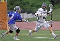 Josh Della Puca controls the ball in the final seconds of  Pleasantville's 9-7 title win over Bronxville.  