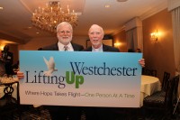 Lifting Up Westchester, the 36 year-old Westchester County social services organization, unveiled its new name and brand identity at the Oasis of Hope Gala at Leewood Golf Course. Pictured are Executive Director Paul Anderson-Winchell (left) with The Rev. Richard Kunz of Grace Church.