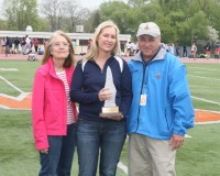 The late Dean Loucks, son of Glenn D. Loucks, the namesake of the Annual Track & Field Games, was honored with The 2015 Eleanor Loucks Memorial Award. Dean Loucks passed away in October 2014. He was represented at the award ceremony by his widow Barbara Loucks (left) and daughter Kathy Loucks (center). Assistant Meet Director Nick Panaro presented the Award. 